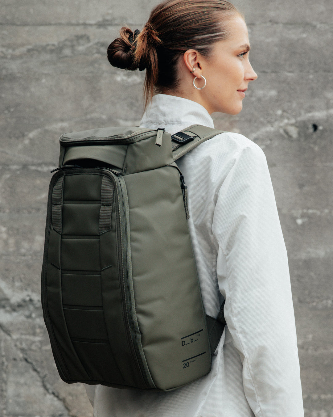 Moss Green_on person_ Hugger 20L.jpg