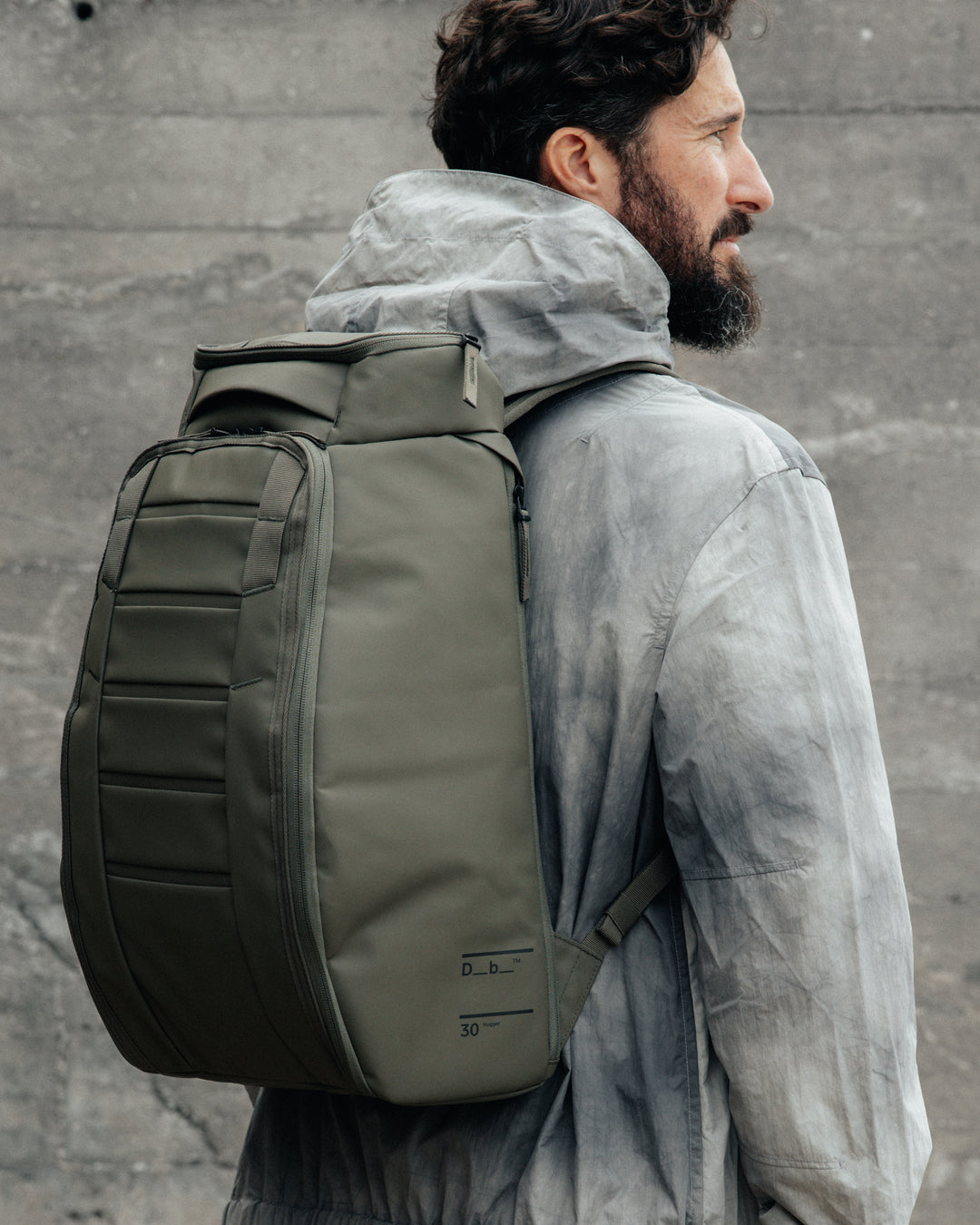 Moss Green_on person_ Hugger 30L.jpg